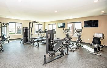 Fitness Center With Modern Equipment at Scharbauer Flats, Texas